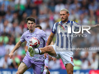 John Swift of West Bromwich (R) and Joshua Key of Swansea are in action during the Sky Bet Championship match between West Bromwich Albion a...