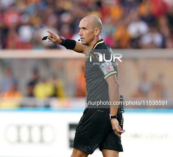 Referee Michael Fabbri officiates the Serie A match between Lecce and Cagliari in Lecce, Italy, on August 31, 2024. 