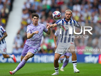 John Swift of West Bromwich (R) and Joshua Key of Swansea are in action during the Sky Bet Championship match between West Bromwich Albion a...