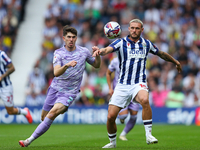 John Swift of West Bromwich (R) and Joshua Key of Swansea are in action during the Sky Bet Championship match between West Bromwich Albion a...