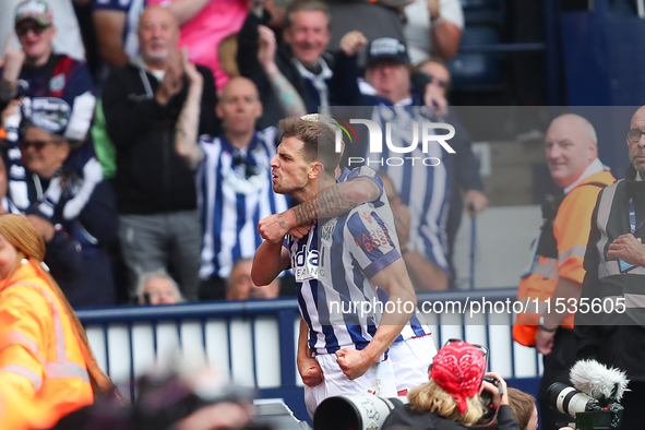 Jayson Molumby of West Bromwich celebrates after scoring his team's first goal during the Sky Bet Championship match between West Bromwich A...