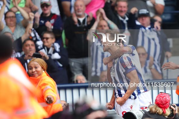 Jayson Molumby of West Bromwich celebrates after scoring his team's first goal during the Sky Bet Championship match between West Bromwich A...