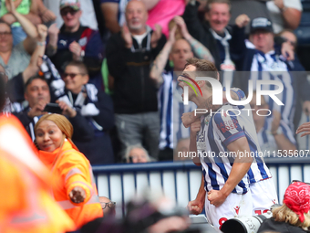 Jayson Molumby of West Bromwich celebrates after scoring his team's first goal during the Sky Bet Championship match between West Bromwich A...