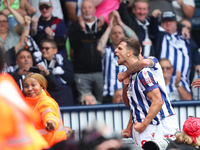 Jayson Molumby of West Bromwich celebrates after scoring his team's first goal during the Sky Bet Championship match between West Bromwich A...