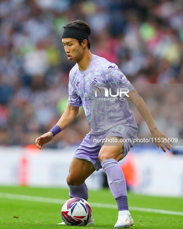 Eom Ji-sung of Swansea is in action during the Sky Bet Championship match between West Bromwich Albion and Swansea City at The Hawthorns in...