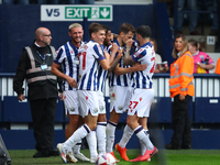 Jayson Molumby of West Bromwich celebrates with his teammates after scoring his team's first goal during the Sky Bet Championship match betw...