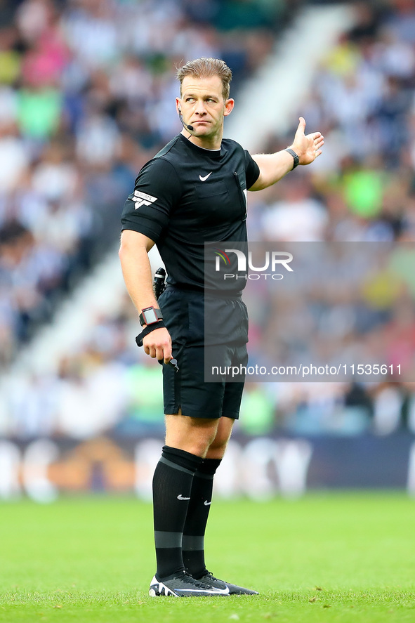 Referee Anthony Backhouse officiates the Sky Bet Championship match between West Bromwich Albion and Swansea City at The Hawthorns in West B...