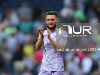 Swansea City's Matt Grimes applauds their fans at the end of the Sky Bet Championship match between West Bromwich Albion and Swansea City at...