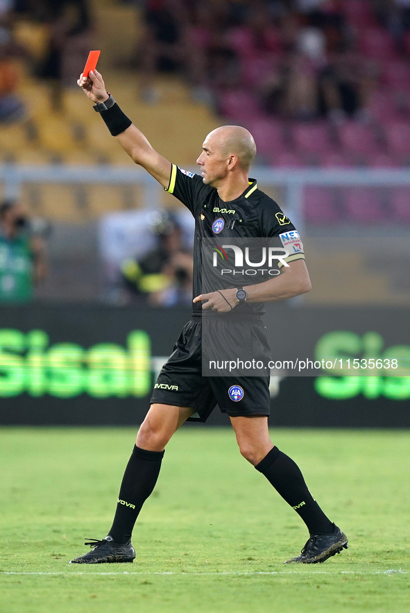 Referee Michael Fabbri officiates the Serie A match between Lecce and Cagliari in Lecce, Italy, on August 31, 2024. 