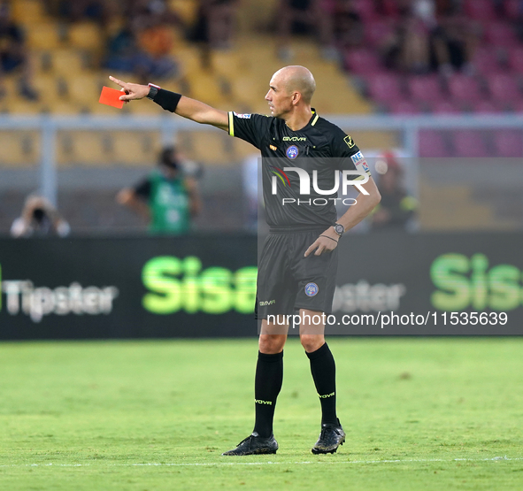 Referee Michael Fabbri officiates the Serie A match between Lecce and Cagliari in Lecce, Italy, on August 31, 2024. 