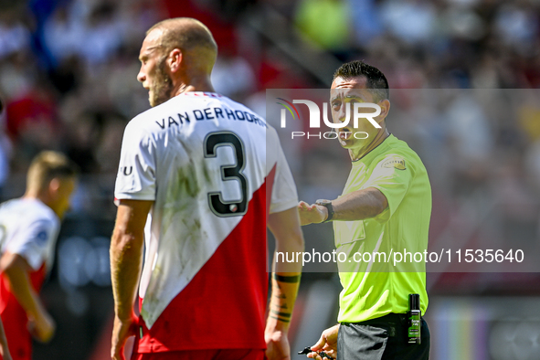 Referee Dennis Higler officiates the match between Utrecht and Twente at Stadium Galgenwaard for the Dutch Eredivisie 4th round season 2024-...