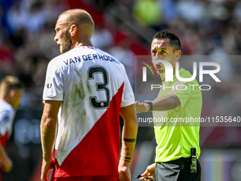 Referee Dennis Higler officiates the match between Utrecht and Twente at Stadium Galgenwaard for the Dutch Eredivisie 4th round season 2024-...