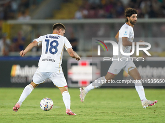 Razvan Marin of Cagliari Calcio is in action during the Serie A match between Lecce and Cagliari in Lecce, Italy, on August 31, 2024. (