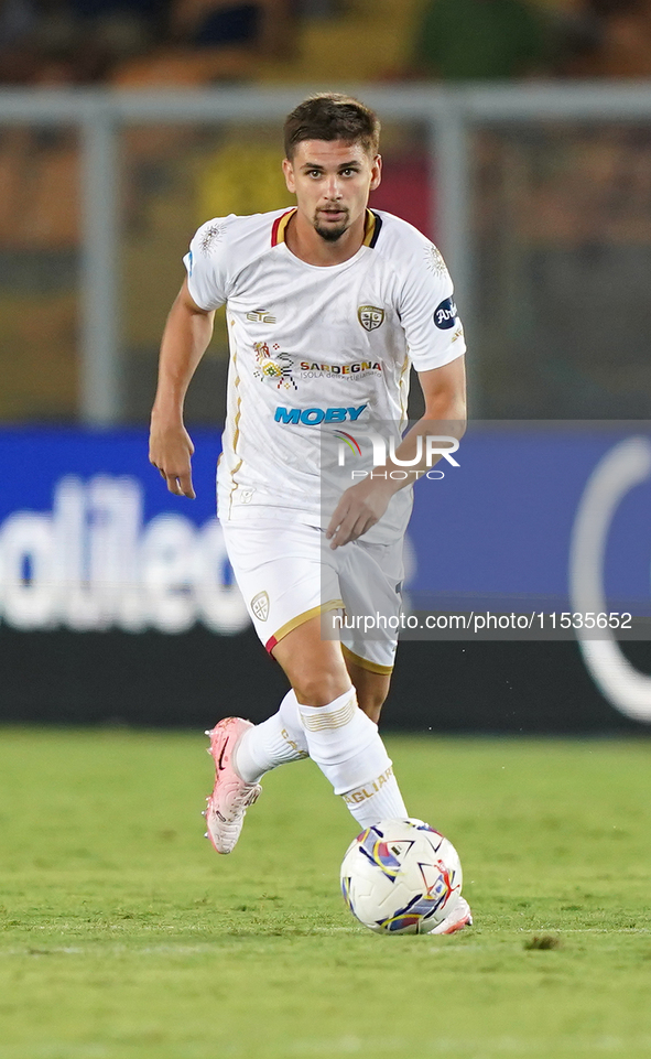 Razvan Marin of Cagliari Calcio is in action during the Serie A match between Lecce and Cagliari in Lecce, Italy, on August 31, 2024. 