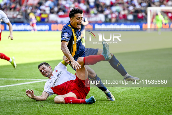 FC Utrecht player Nick Viergever and FC Twente player Sayf Ltaief during the match Utrecht vs. Twente at Stadium Galgenwaard for the Dutch E...