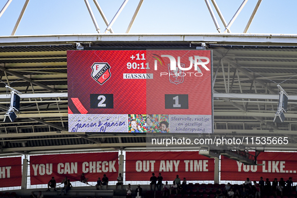 The scoreboard shows eleven minutes of extra time during the match between Utrecht and Twente at Stadium Galgenwaard for the Dutch Eredivisi...