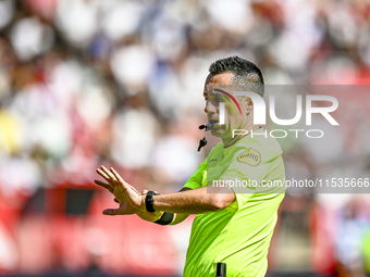 Referee Dennis Higler officiates the match between Utrecht and Twente at Stadium Galgenwaard for the Dutch Eredivisie 4th round season 2024-...