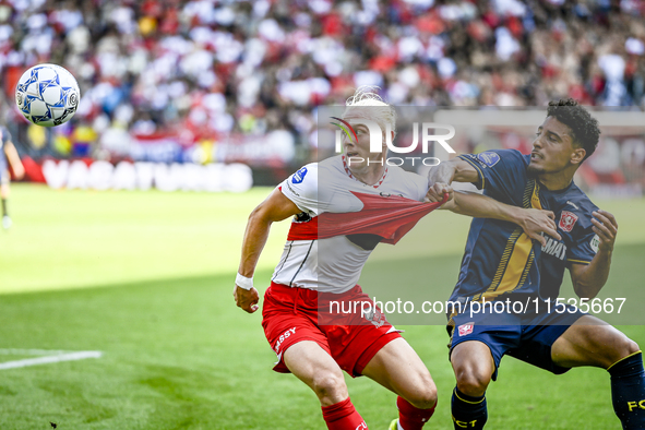 FC Utrecht player Kolbeinn Finnsson and FC Twente player Sayf Ltaief during the match between Utrecht and Twente at Stadium Galgenwaard for...