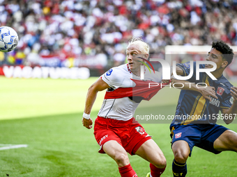 FC Utrecht player Kolbeinn Finnsson and FC Twente player Sayf Ltaief during the match between Utrecht and Twente at Stadium Galgenwaard for...