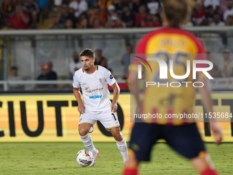 Razvan Marin of Cagliari Calcio is in action during the Serie A match between Lecce and Cagliari in Lecce, Italy, on August 31, 2024. (