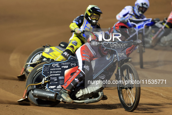 Freddy Hodder of Belle Vue 'Cool Running' Colts leads Max Perry of Edinburgh Monarchs Academy during the WSRA National Development League ma...