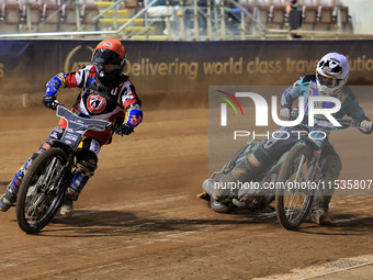 Joe Thompson (Guest) of Belle Vue 'Cool Running' Colts tussles with Mason Watson of Edinburgh Monarchs Academy during the WSRA National Deve...