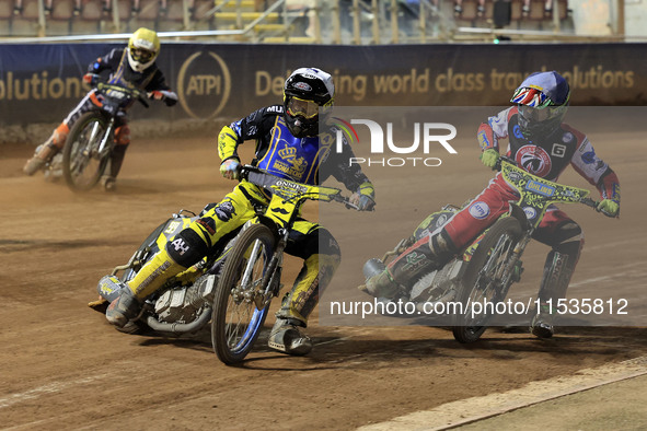 Dayle Wood of Edinburgh Monarchs Academy tussles with William Cairns (Reserve) of Belle Vue 'Cool Running' Colts during the WSRA National De...