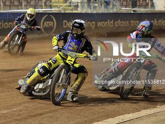 Dayle Wood of Edinburgh Monarchs Academy tussles with William Cairns (Reserve) of Belle Vue 'Cool Running' Colts during the WSRA National De...