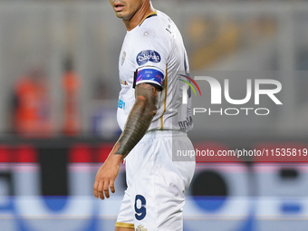 Gianluca Lapadula of Cagliari Calcio is in action during the Serie A match between Lecce and Cagliari in Lecce, Italy, on August 31, 2024. (