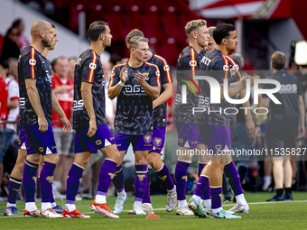 The Go Ahead Eagles warm up during the match PSV vs. Go Ahead Eagles at the Philips Stadium for the Dutch Eredivisie 4th round season 2024-2...