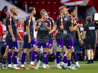 The Go Ahead Eagles warm up during the match PSV vs. Go Ahead Eagles at the Philips Stadium for the Dutch Eredivisie 4th round season 2024-2...