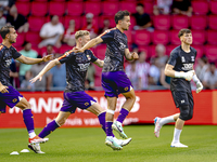 The Go Ahead Eagles warm up during the match PSV vs. Go Ahead Eagles at the Philips Stadium for the Dutch Eredivisie 4th round season 2024-2...