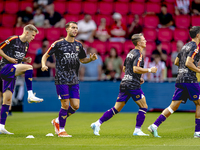 The Go Ahead Eagles warm up during the match PSV vs. Go Ahead Eagles at the Philips Stadium for the Dutch Eredivisie 4th round season 2024-2...