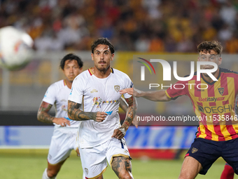 Nicolas Viola of Cagliari Calcio is in action during the Serie A match between Lecce and Cagliari in Lecce, Italy, on August 31, 2024. (