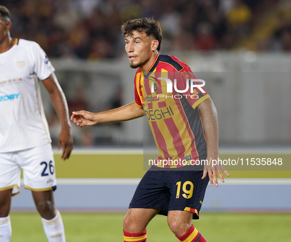 Marcin Listkowski of US Lecce is in action during the Serie A match between Lecce and Cagliari in Lecce, Italy, on August 31, 2024. 