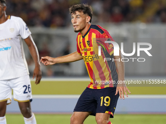 Marcin Listkowski of US Lecce is in action during the Serie A match between Lecce and Cagliari in Lecce, Italy, on August 31, 2024. (