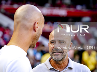 PSV trainer Peter Bosz and Go Ahead Eagles trainer Paul Simonis during the match between PSV and Go Ahead Eagles at the Philips Stadium for...