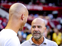 PSV trainer Peter Bosz and Go Ahead Eagles trainer Paul Simonis during the match between PSV and Go Ahead Eagles at the Philips Stadium for...