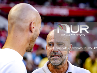 PSV trainer Peter Bosz and Go Ahead Eagles trainer Paul Simonis during the match between PSV and Go Ahead Eagles at the Philips Stadium for...