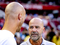 PSV trainer Peter Bosz and Go Ahead Eagles trainer Paul Simonis during the match between PSV and Go Ahead Eagles at the Philips Stadium for...