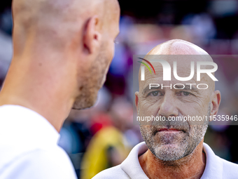 PSV trainer Peter Bosz and Go Ahead Eagles trainer Paul Simonis during the match between PSV and Go Ahead Eagles at the Philips Stadium for...