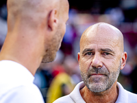 PSV trainer Peter Bosz and Go Ahead Eagles trainer Paul Simonis during the match between PSV and Go Ahead Eagles at the Philips Stadium for...