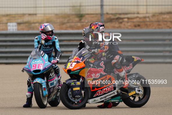 Jake Dixon (96) of Great Brof Italy and in and Cfmoto Inde Aspar Team Kalex, Tony Arbolino (14) of Italy and Elf Marc Vds Racing Team Kalex...