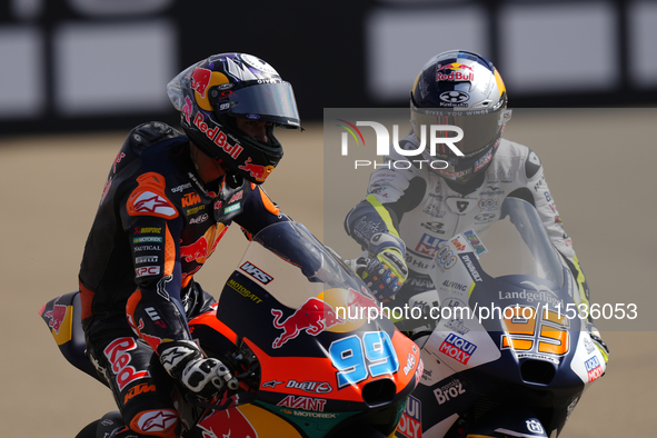 Jose Antonio Rueda (99) of Spain and Red Bull KTM Ajo KTM and Collin Veijer (95) of Netherlands and Liqui Moly Husqvarna Intact GP during th...