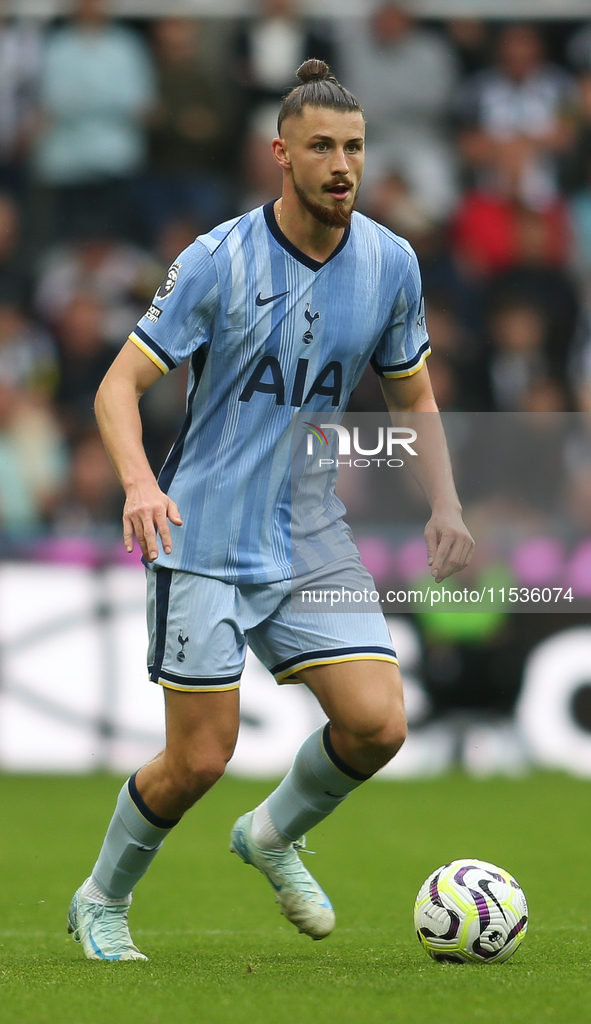 Tottenham Hotspur's Radu Dragusin during the Premier League match between Newcastle United and Tottenham Hotspur at St. James's Park in Newc...