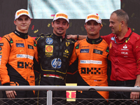 Lando Norris of McLaren, Charles Leclerc of Ferrari and Lando Norris of McLaren after the Formula 1 Italian Grand Prix at Autodromo Nazional...