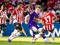 Go Ahead Eagles player Jakob Breum and PSV player Richard Ledezma during the match PSV vs. Go Ahead Eagles at the Philips Stadium for the Du...