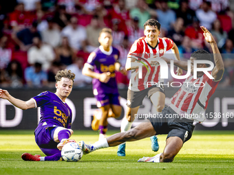 Go Ahead Eagles player Jakob Breum and PSV player Ryan Flamingo during the match PSV vs. Go Ahead Eagles at the Philips Stadium for the Dutc...