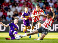 Go Ahead Eagles player Jakob Breum and PSV player Ryan Flamingo during the match PSV vs. Go Ahead Eagles at the Philips Stadium for the Dutc...