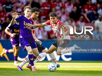 Go Ahead Eagles player Jakob Breum and PSV player Richard Ledezma during the match PSV vs. Go Ahead Eagles at the Philips Stadium for the Du...